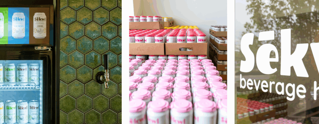 A cooler with colorful beverages, a case of beverages with pink plastic lids, and a sign on a glass door that says Sekwl