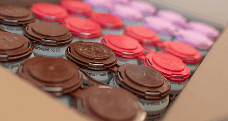 Colorful plastic lids on beverage cans